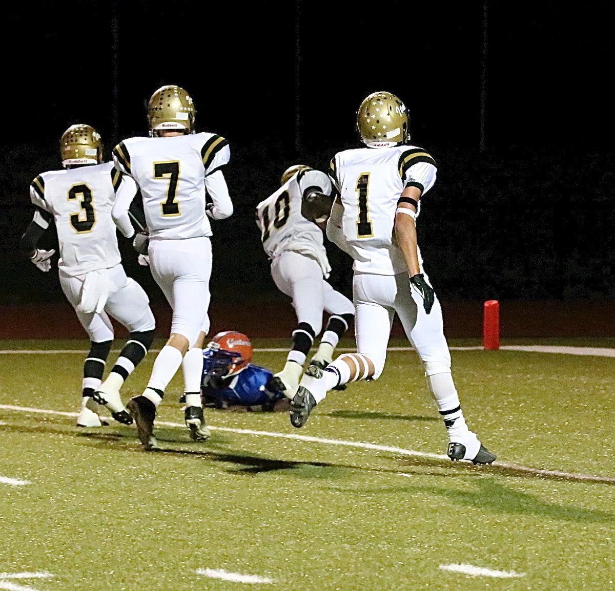 Image: Gladiator QB TaMarcus Sheppard(10) runs into the end zone from 20-yards out to pull Italy within 1-point of Gateway, 8-7, in the first-quarter with teammates Trevon Robertson(3), Ryan Connor(7) and Levi McBride(1) ensuring his success.