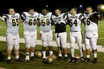 Image: A group of Gladiator linemen celebrate their team’s comeback heroics. Tyler “Diesel” Vencill(65), Kevin “The Toe” Roldan(60), Darol Mayberry(58), Zain “Zilla” Byers(50), Bailey Walton(54) and Colin Newman(76) were all part of Italy’s defensive line rotation.