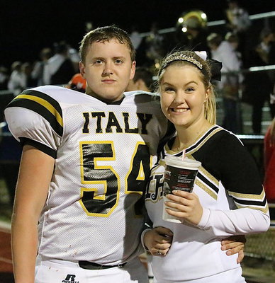Image: Bailey Walton(54) and cheer captain Taylor Turner are a couple of happy seniors.