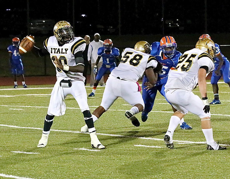 Image: Darol Mayberry(58) and Shad Newman(25) protect quarterback TaMarcus Sheppard(10), all are seniors.