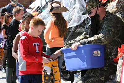 Image: Ty Cash cashes in during Trunk-or-Treat at Stafford Elementary.