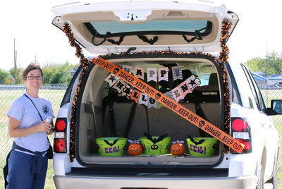 Image: Sophie Creighton shows her Halloween trunk display.