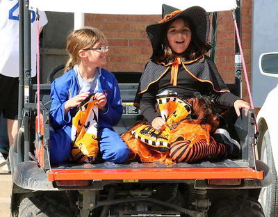 Image: Katie South and Evie South cannot wait to dig into their Halloween candy bags after participating in the Stafford Elementary’s Trunk-or-Treat event.