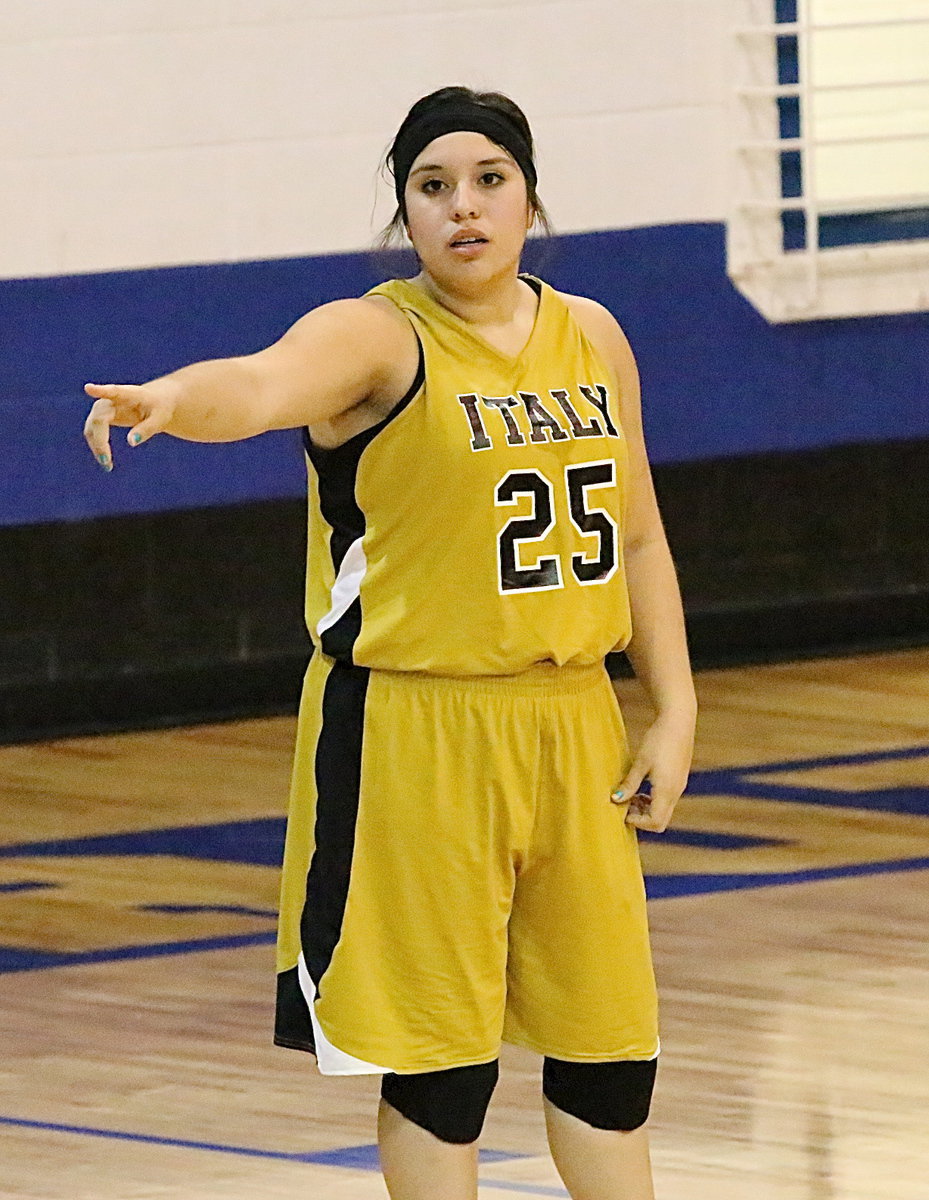 Image: Monserrat Figueroa(25) checks with Coach Fullmer on the defensive end.