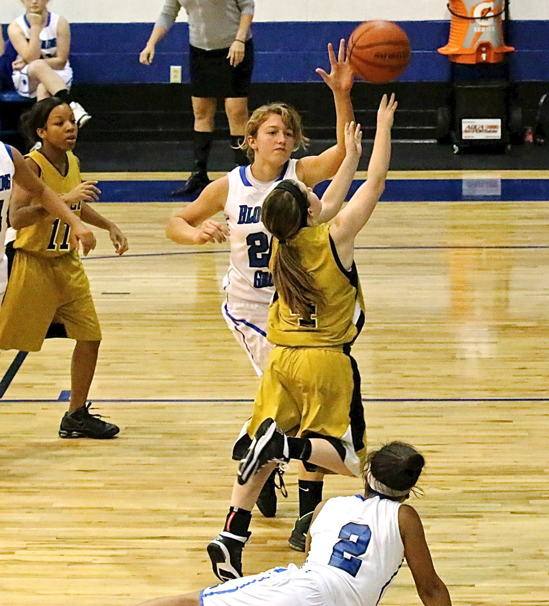 Image: Putting up the shot is Italy point guard Tara Wallis(4).