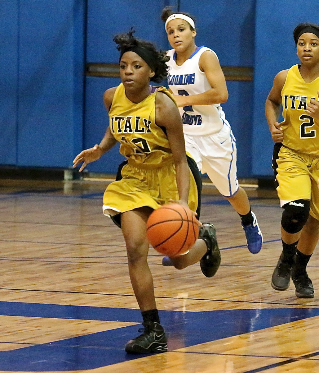 Image: Kendra Copeland(10) hurries the ball up the floor with teammate Bernice Hailey(2) tracking the ball.