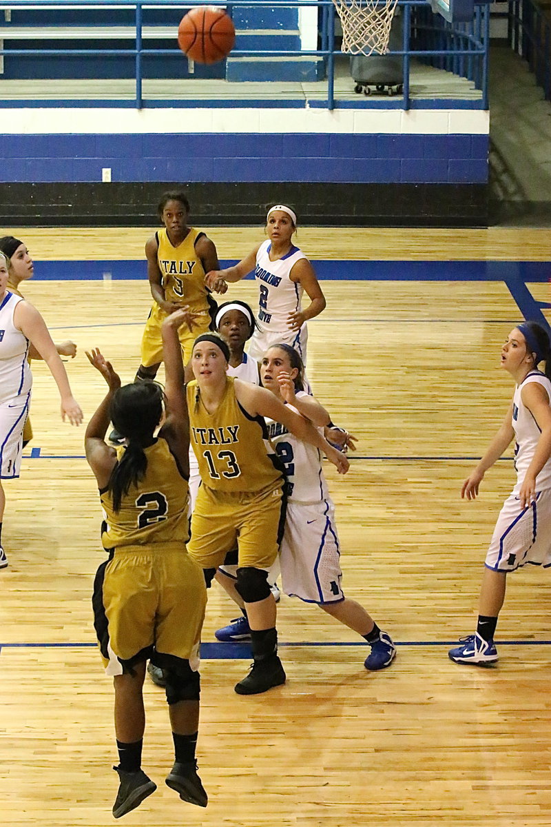 Image: Bernice Hailey(2) takes a jump shot with teammate Jaclynn Lewis(13) keeping BG defenders back.