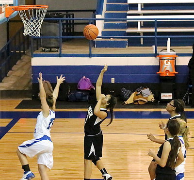 Image: Ashlyn Jacinto(13) takes a shot to finish the fast break.