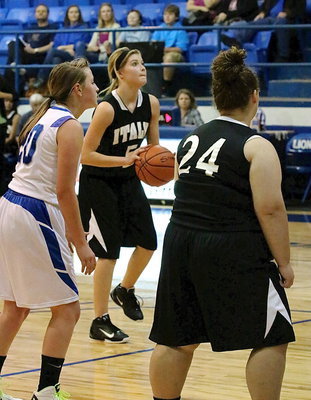 Image: Halee Turner(5) is at the free-throw line with teammate Rebekah Corley(24) ready to rebound.