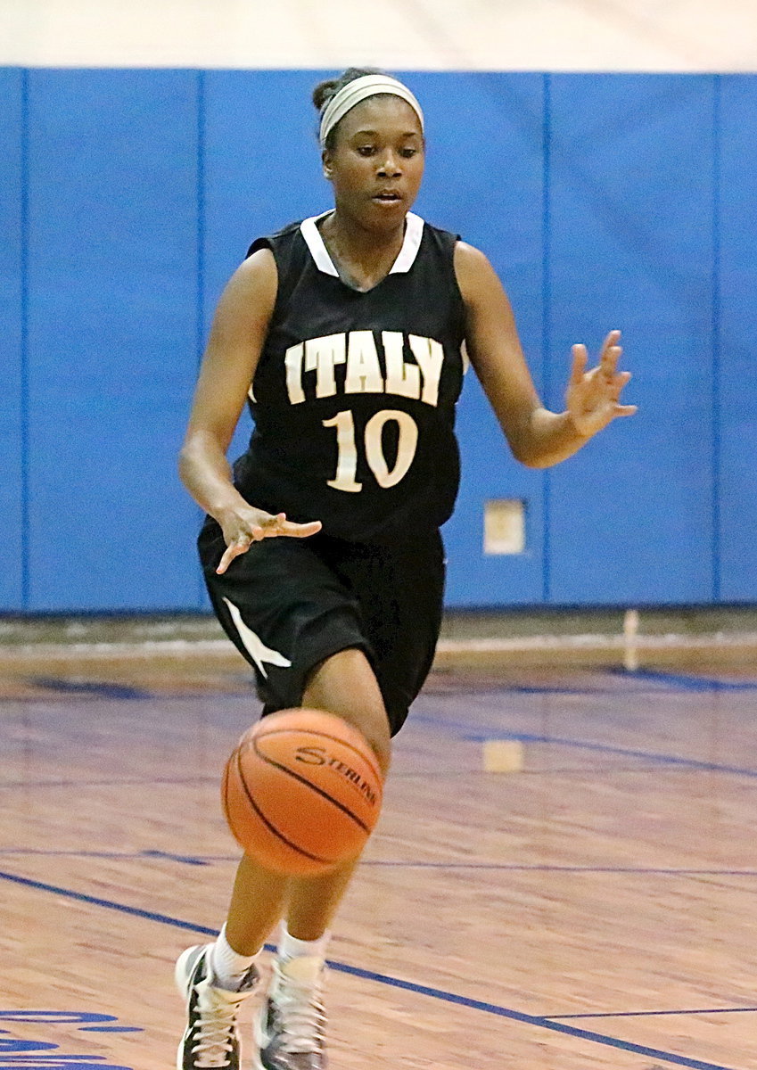 Image: Janae Robertson(10) pushes the ball toward the goal.