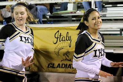 Image: Senior Cheerleaders Taylor Turner and Jessica Garcia dance their last home game away.