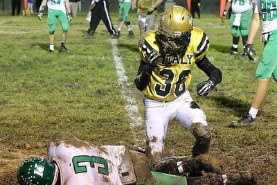 Image: JV Gladiator Fabian Cortez(36) gets his first look at varsity action…if only he could see. Cortez finished with 2 tackles and a mask full of mud to end the game.