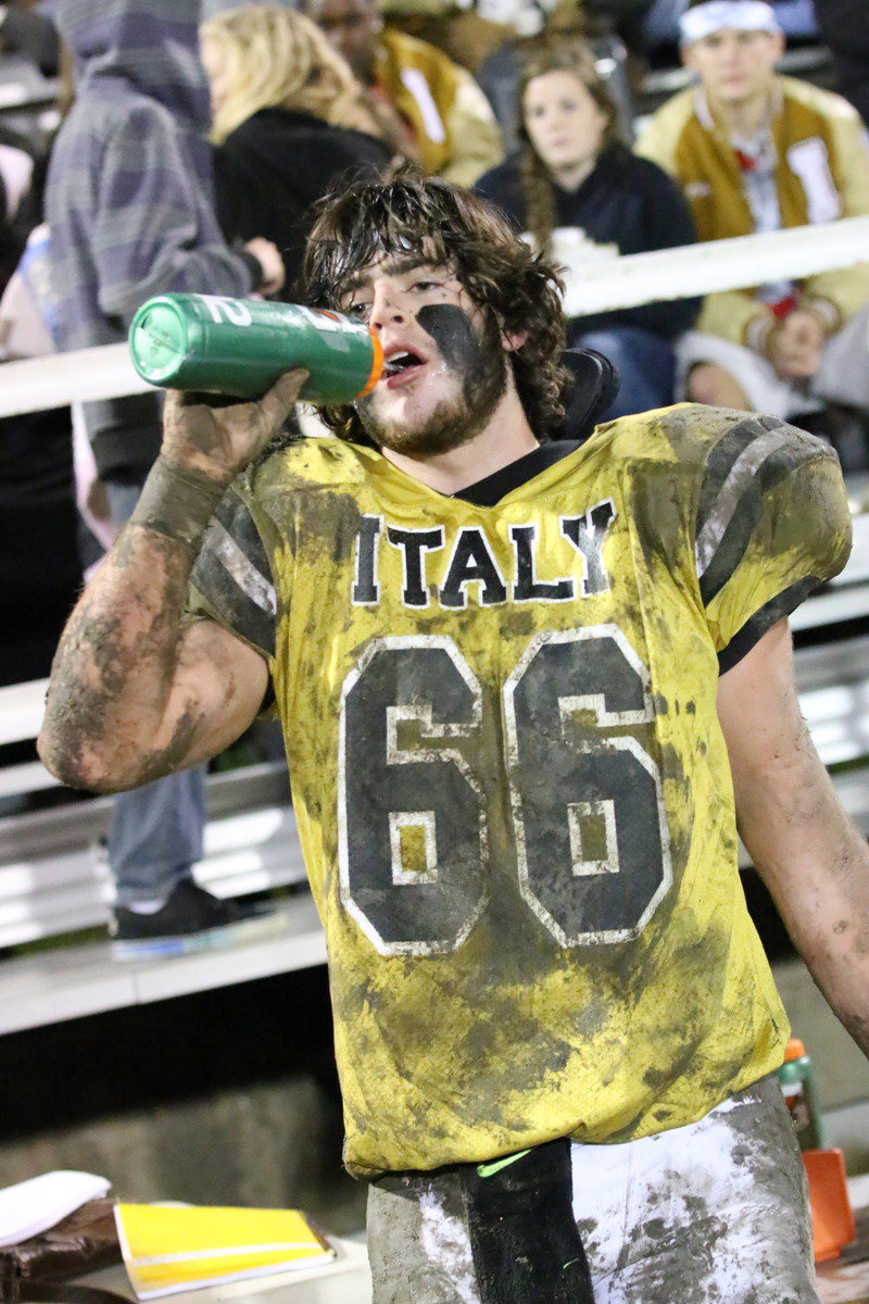 Image: Junior center Kyle Fortenberry(66) deserves some water….and maybe some soap.