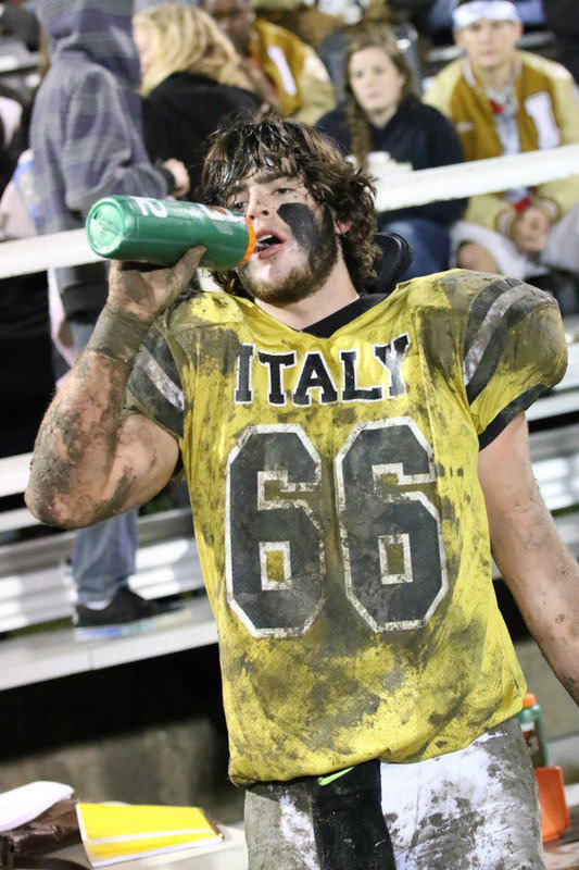 Image: Junior center Kyle Fortenberry(66) deserves some water….and maybe some soap.