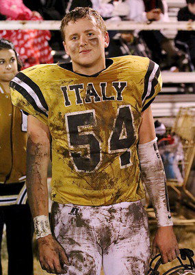 Image: Only senior Bailey Walton(54) could make this much mud look this good.