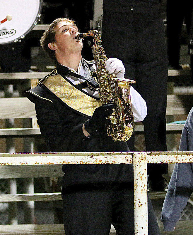 Image: One of two band seniors, Joe Mack Pitts plays and grooves out on his saxophone.