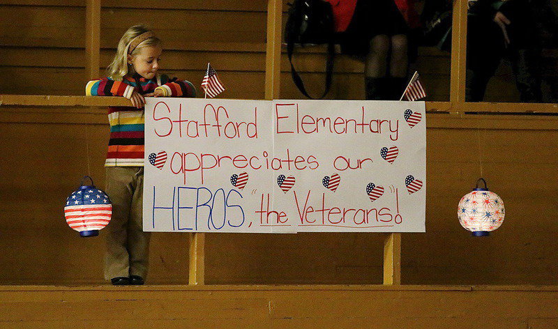 Image: Stafford students make signs and posters to honor their heroes.