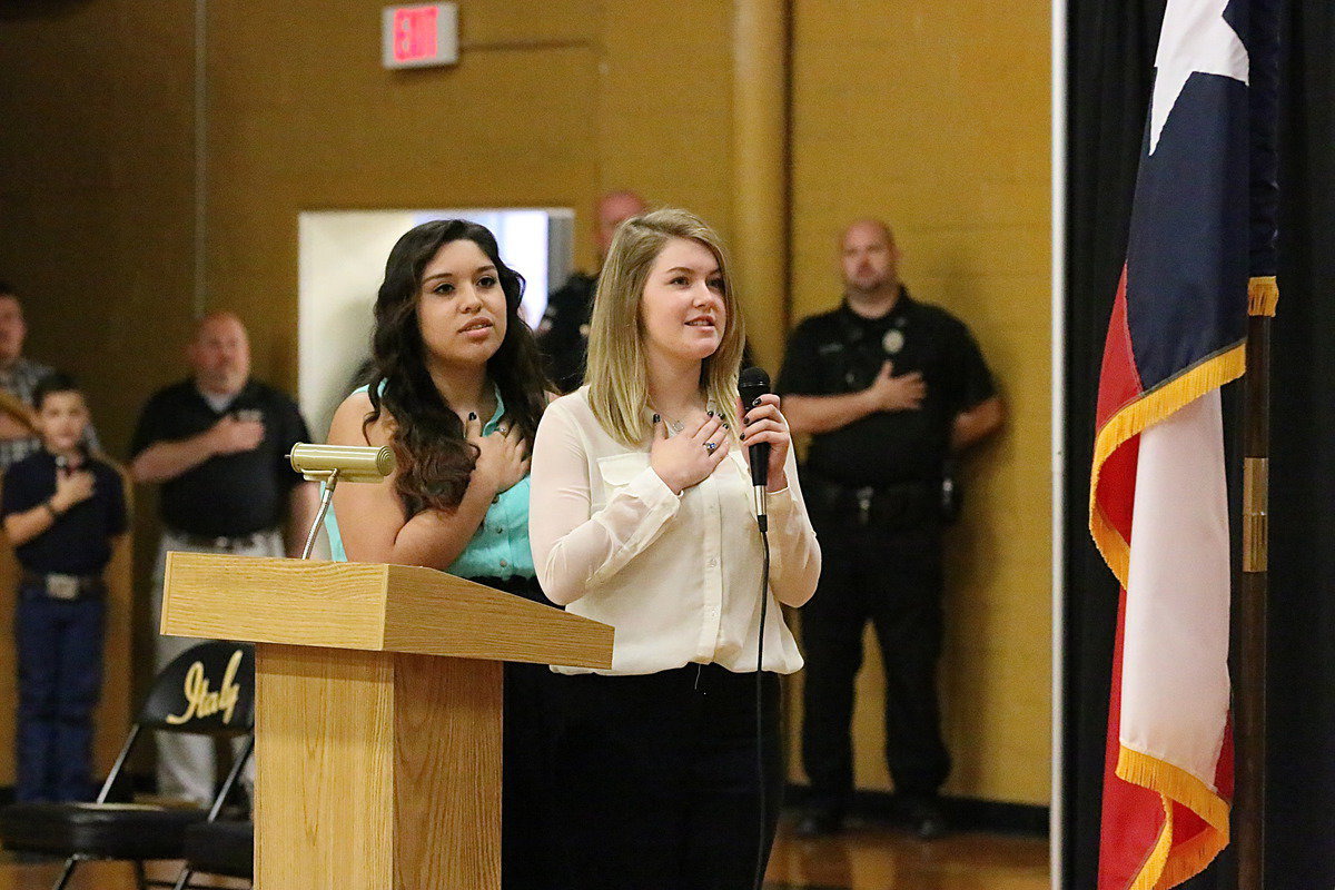 Image: After senior Monserrat Figueroa led the Pledge of Allegiance, fellow senior Taylor Turner leads the Texas Pledge.