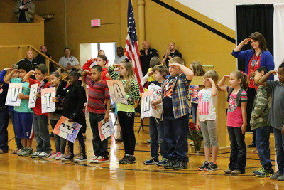 Image: Stafford Elementary 3rd Graders recite the Acrostic Poem for V-e-t-e-r-a-n-s.