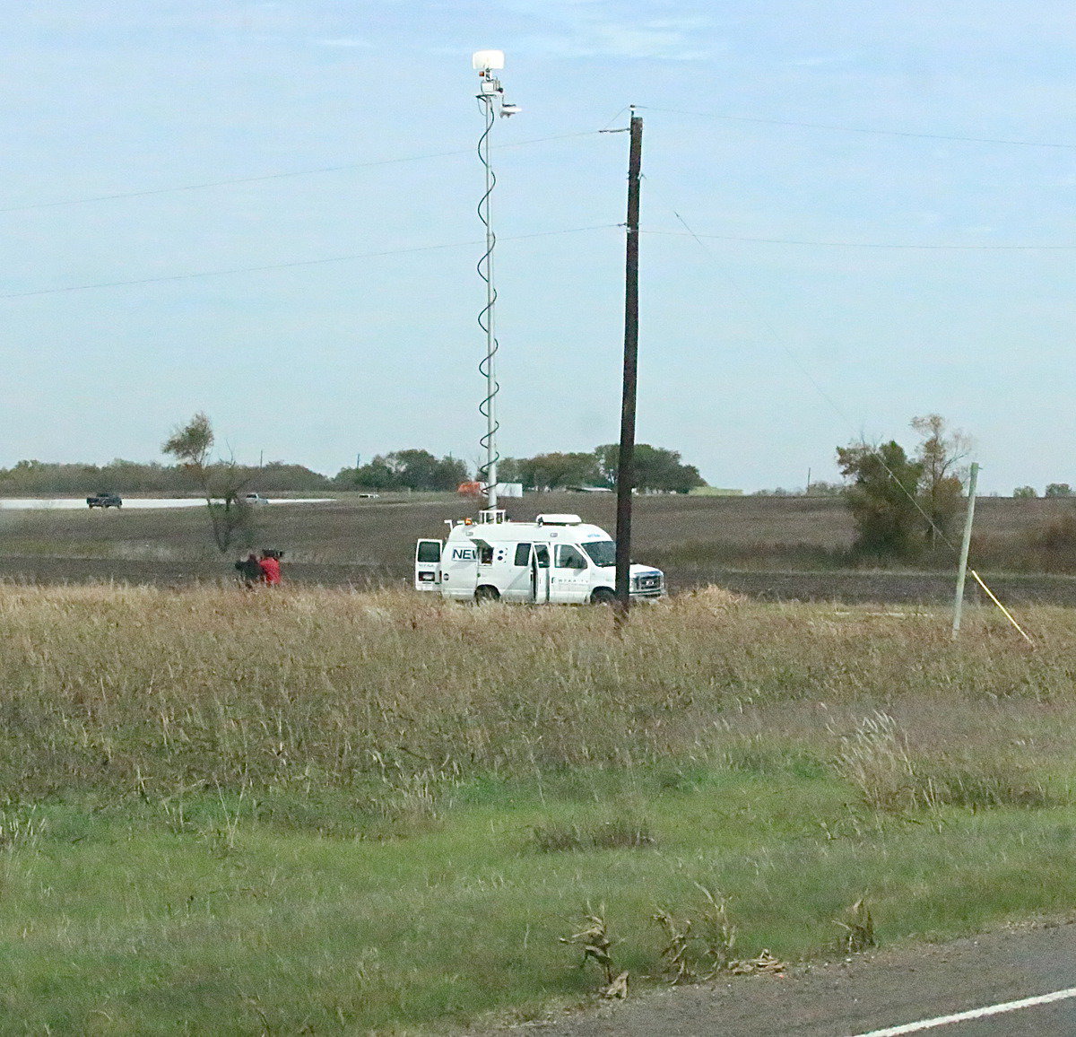 Image: News vans out of Dallas setup camera perches around Milford.