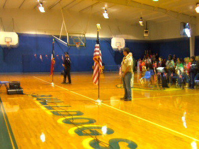 Image: Milford Police Chief Carlos Phoenix and Russell Johnson (Boy Scouts of America troop 251) performing the Posting of the Colors.