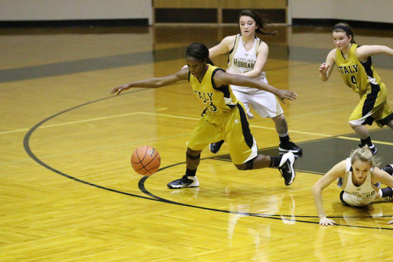 Image: Kortnei Johnson(3) steals the ball and then pushes the ball up court.