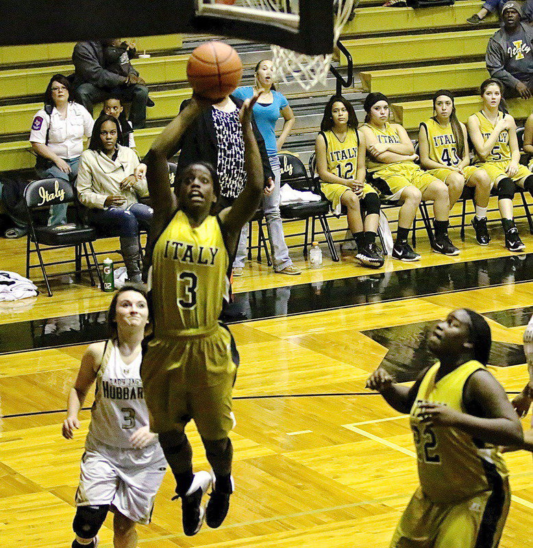 Image: Kortnei Johnson(3) goes in for a bucket.