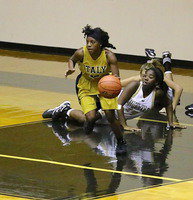 Image: Kendra Copeland(10) emerges from the fray with the ball.