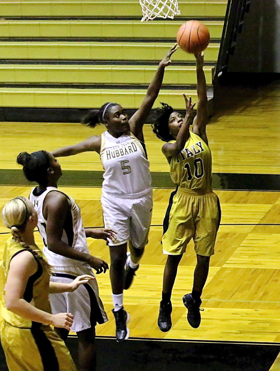 Image: Kendra Copeland(10) puts up the shot.