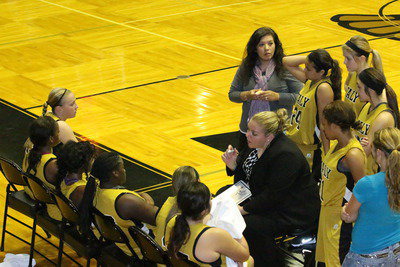 Image: Head coach Melissa Fullmer talks to her ladies during a timeout.