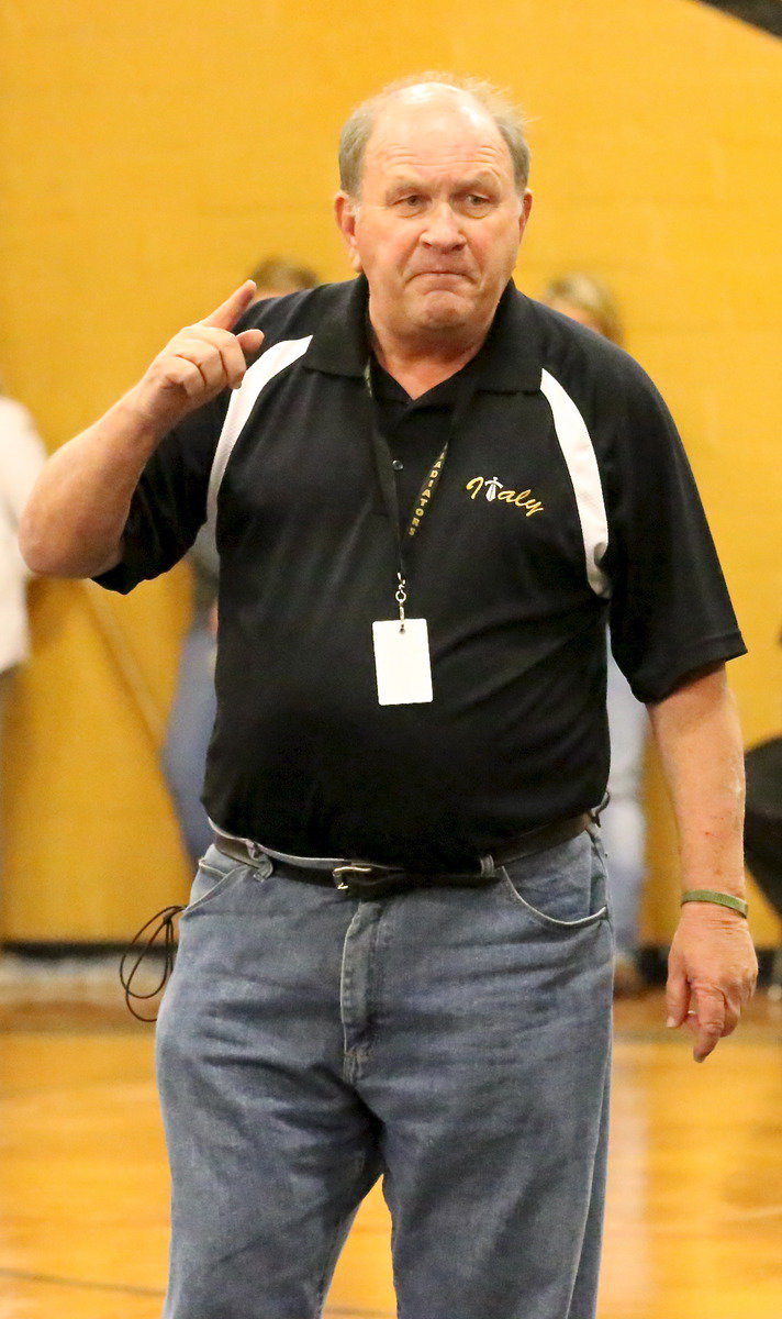 Image: Coach Jones delivers the pre-game rah-rah speech.