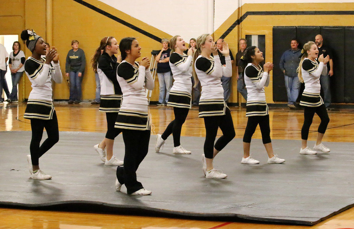 Image: Cheerleaders K’Breona Davis, Paige Little, Ashlyn Jacinto, Taylor Turner, Kelsey Nelson, Jessica Garcia and Britney Chambers lead the cheers.