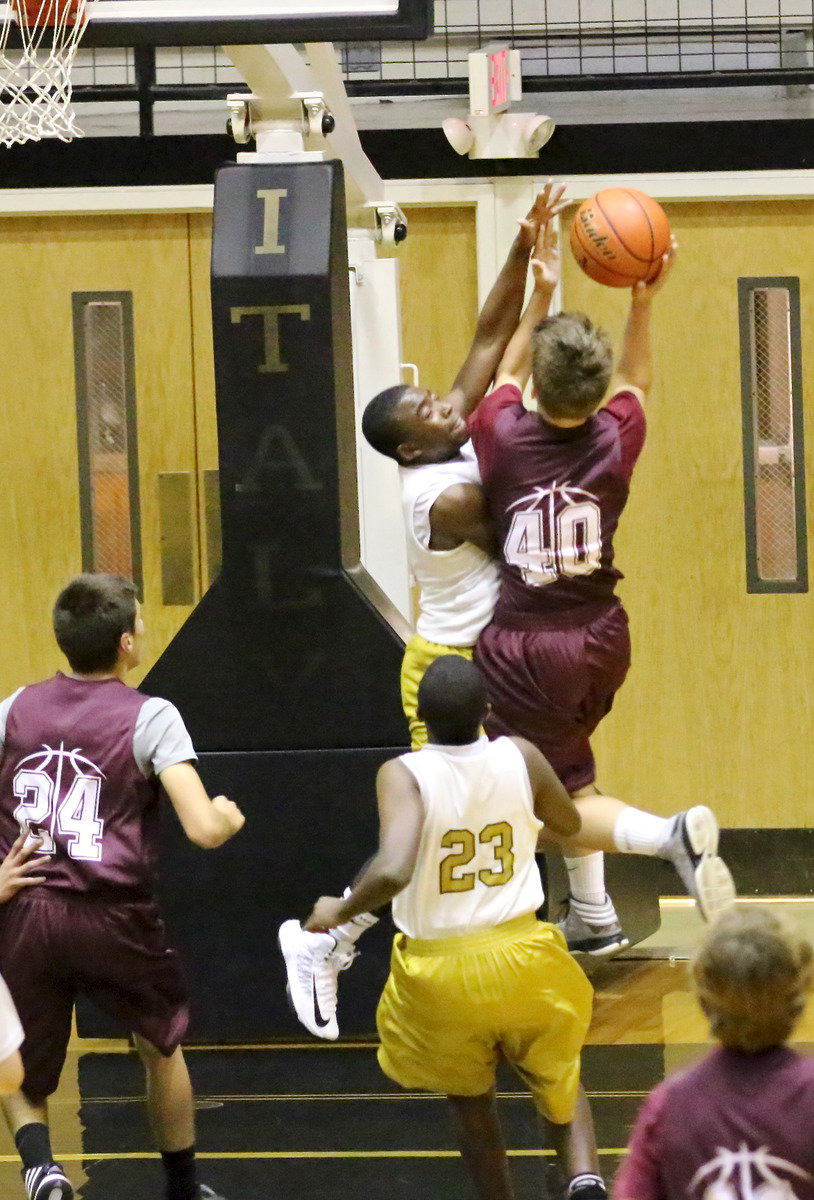 Image: Italy’s Kendrick Norwood(5) challenges a Mildred shooter during the 8th grade’s season opening matchup inside Italy Coliseum Monday night.