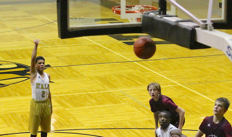 Image: 8th grader Tylan Wallace(2) swishes in a free shot for Italy.