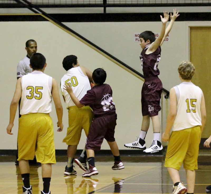 Image: Mario Rodriguez(50) fights thru a flock of Eagle defenders.