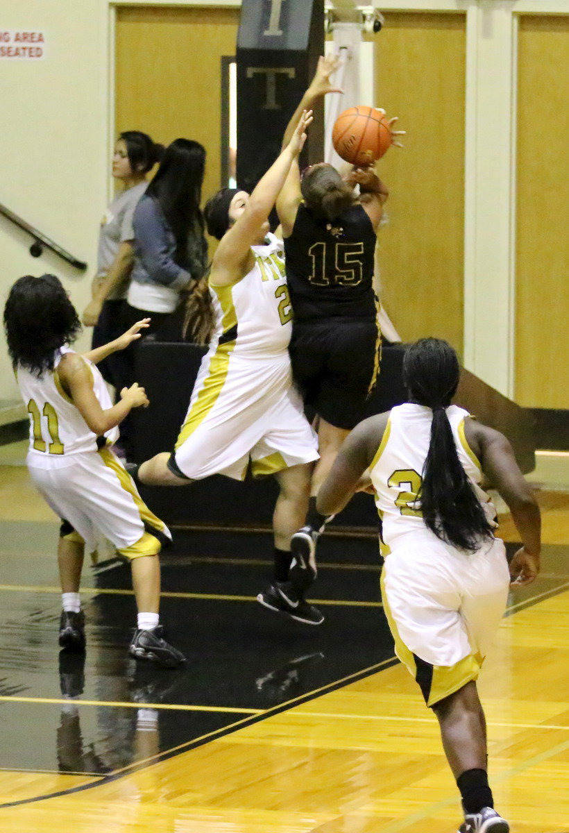 Image: Monserrat Figueroa(25) denies Malakoff an easy basket.