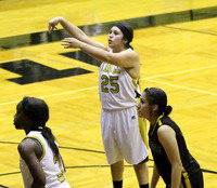 Image: Monserrat Figueroa(25) pulls off a three-point play the old fashioned way.