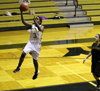 Image: Kortnei Johnson(3) leaves the Lady Tigers behind to lead all scorers with 20-points.