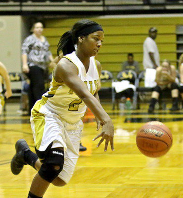 Image: Bernice Hailey(2) pushes the ball up the court.