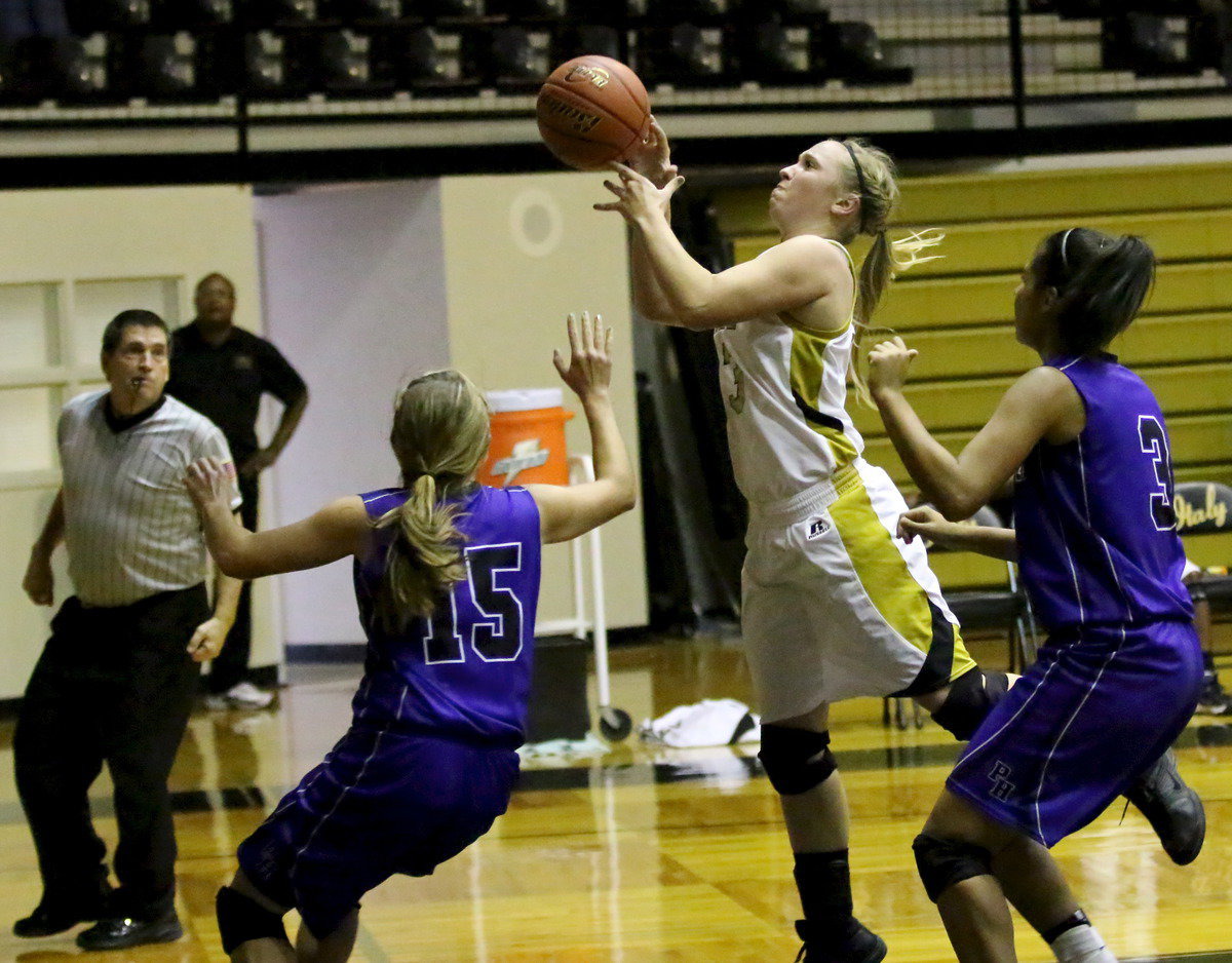 Image: Jaclynn Lewis(13) draws a shooting foul.