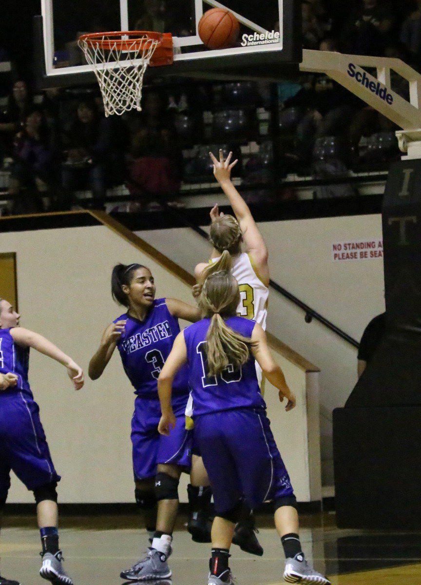 Image: Jaclynn Lewis(13) banks in basket.