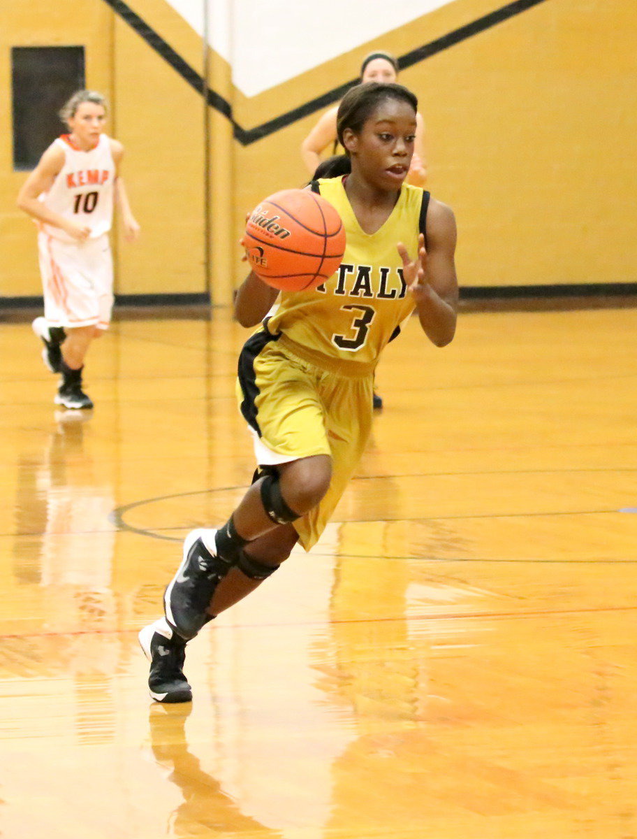 Image: Going to the basket is Lady Gladiator Kortnei Johnson(3).