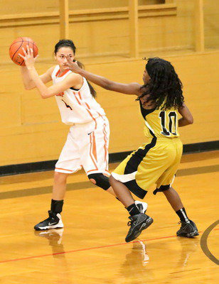 Image: Kendra Copeland(10) closes in on a Kemp passer.