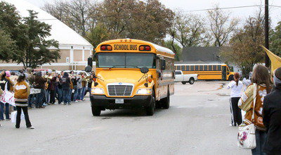 Image: The team bus receives plenty of support the Italy HS student body and fans!