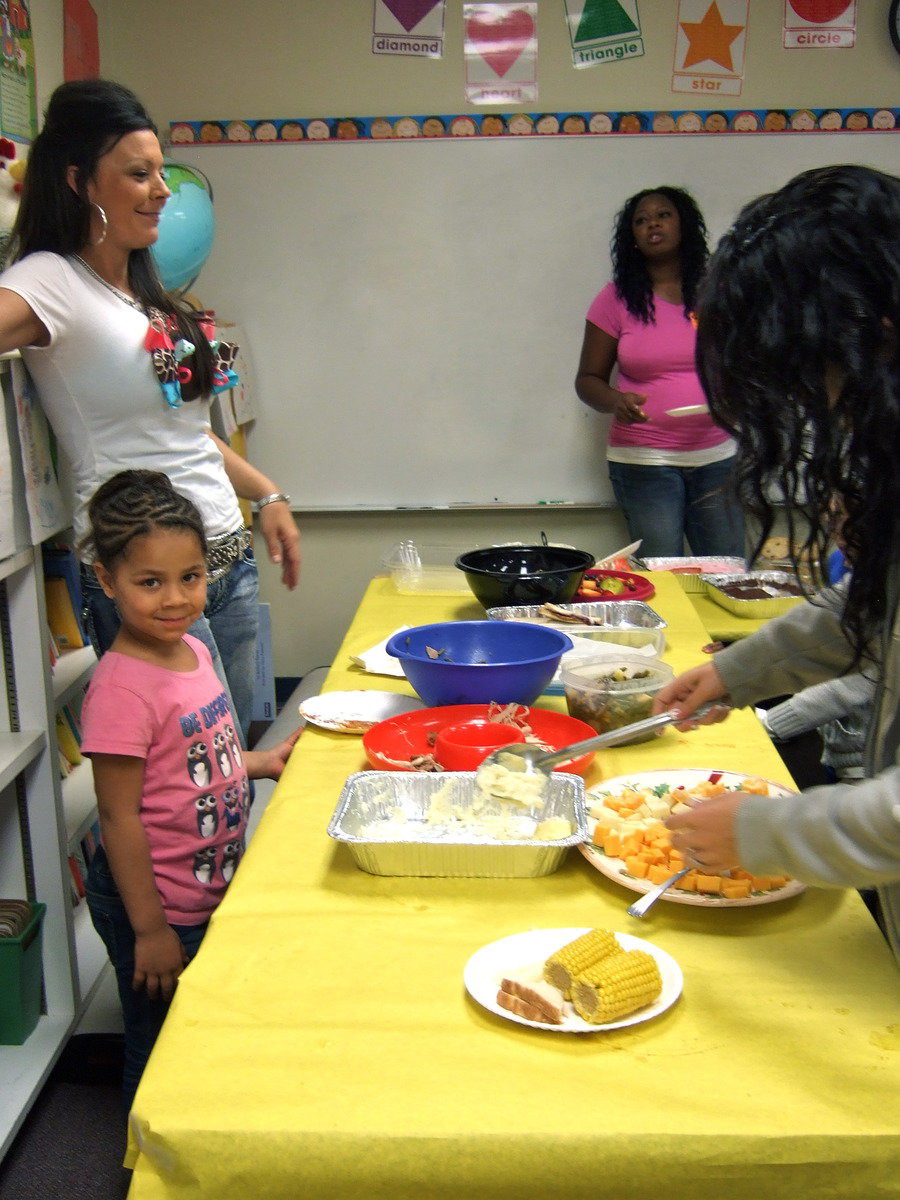 Image: Mrs. Aguado (pre-K teacher) very pleased with how well the celebration is going.