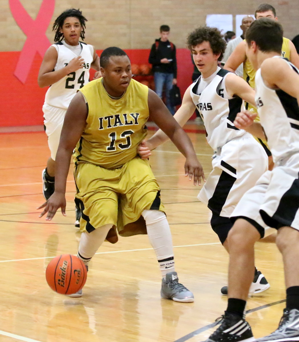 Image: Darol Mayberry(13) draws attention from Zebra defenders.