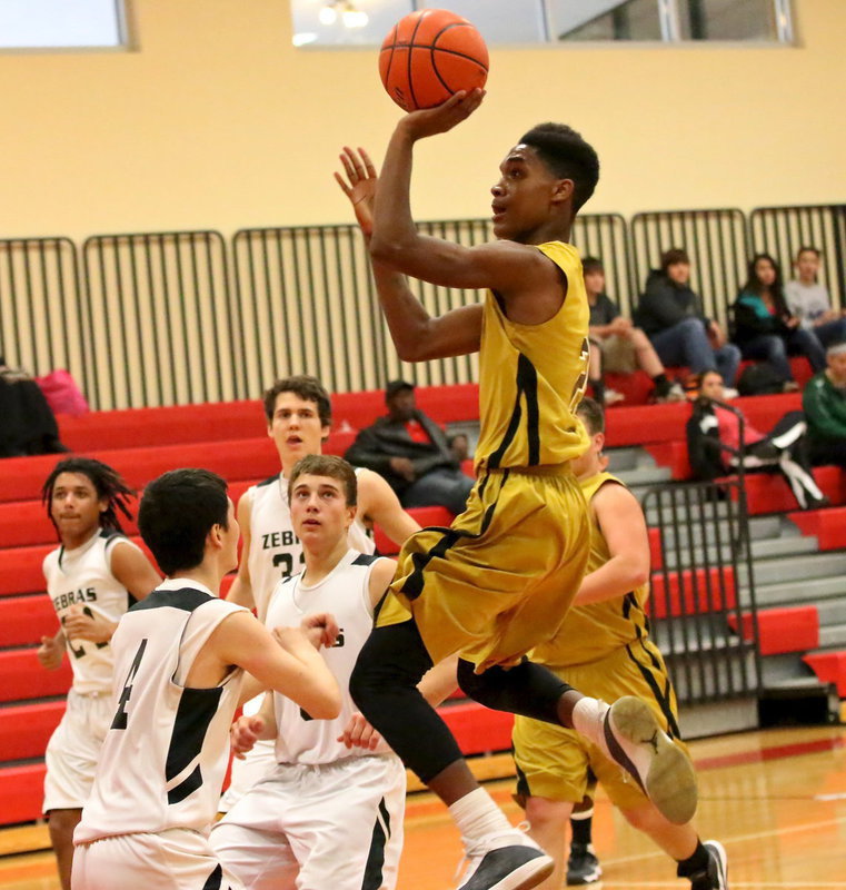 Image: Trevon Robertson(2) was playing on another level while leading Italy to a first-round win over Grandview.