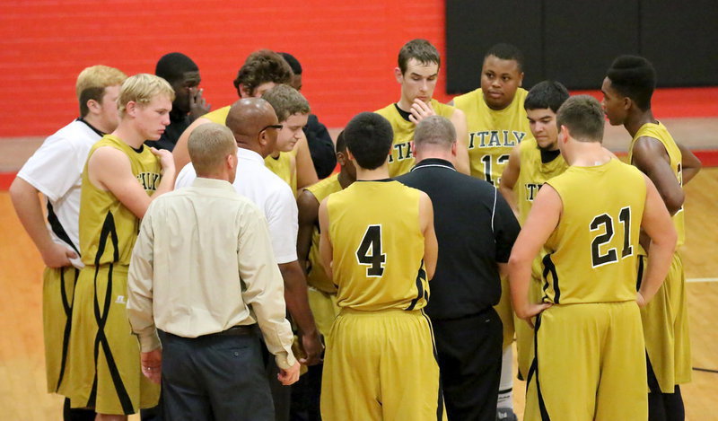 Image: Gladiator head coach Brandon Ganske draws up a play during a timeout.