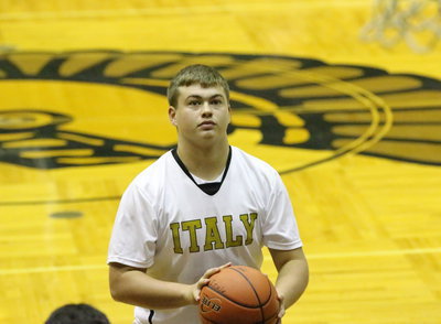 Image: Senior post player Zain Byers practices a free-throw before Italy’s game against Madisonville.