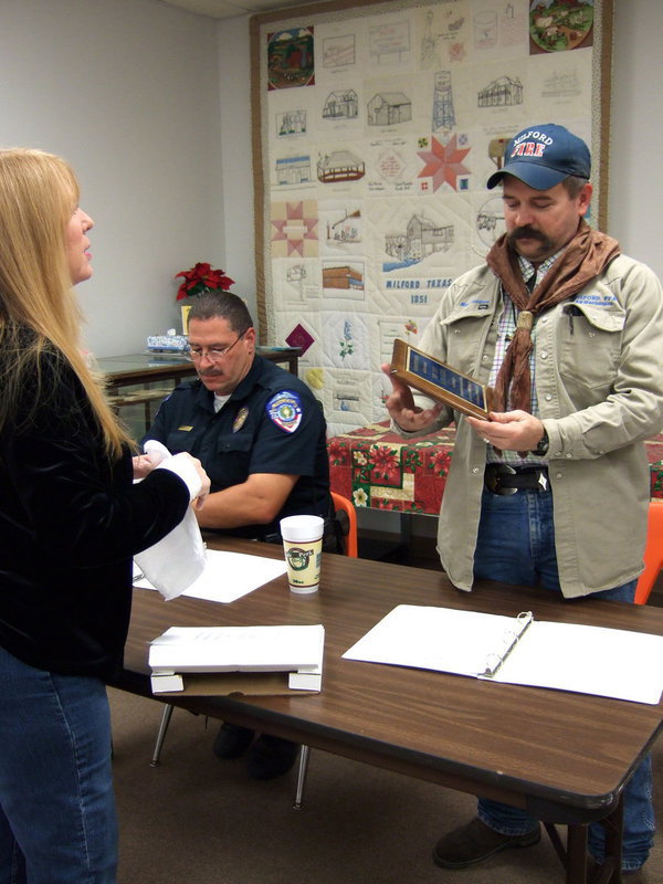 Image: Fire Chief Jackson receives his plaque.